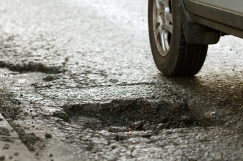 Council chiefs call for £130m to fix potholes image