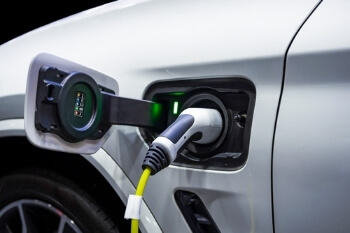 Councils need Government support to deliver fair EV charging, says ADEPT image