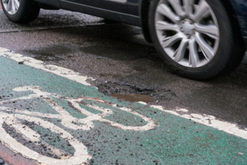Councils warned over £16m of fake pothole claims image