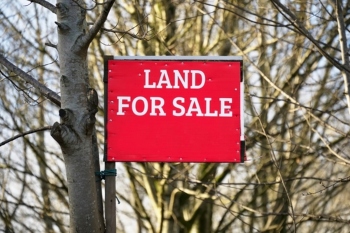 Questions over council land purchase proposals image