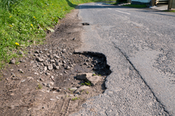 RAC slams councils over pothole repair quality image