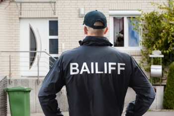 Time to ban the use of bailiffs image